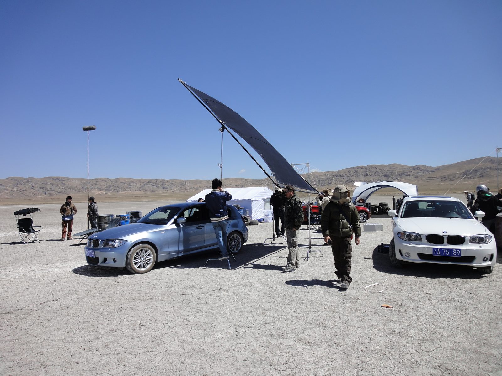 Aerial view of the 3 km crop circle drifted into the Gobi desert with BMW 1 Series cars
